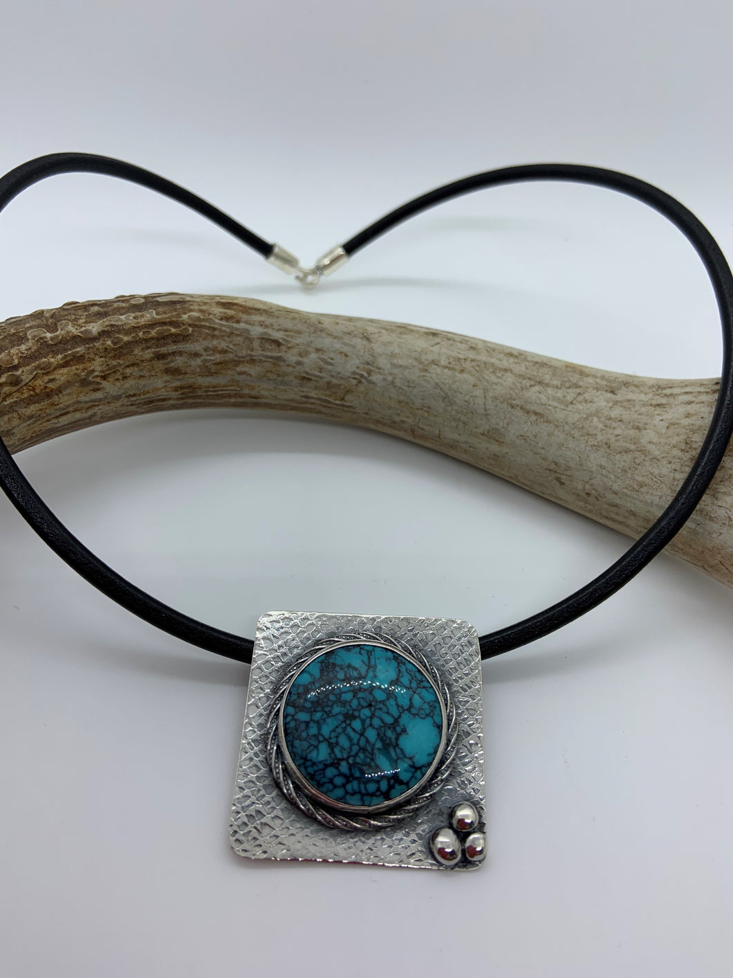 Sterling silver and Turquoise on 4 mm  18 inch leather cord