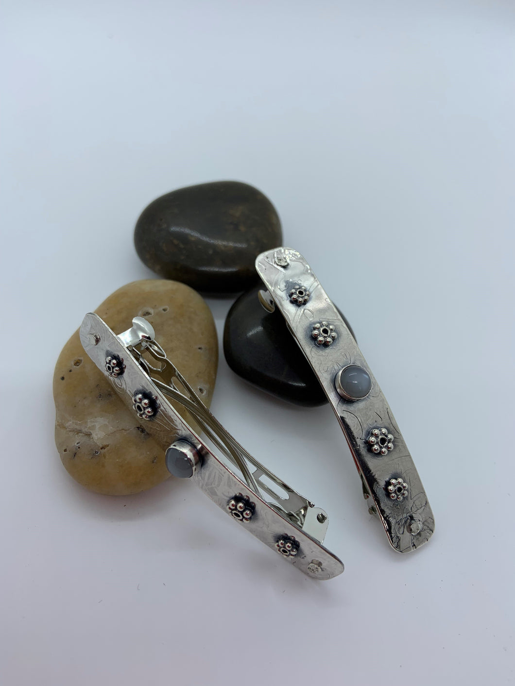 Sterling silver barrette with gray moonstones.