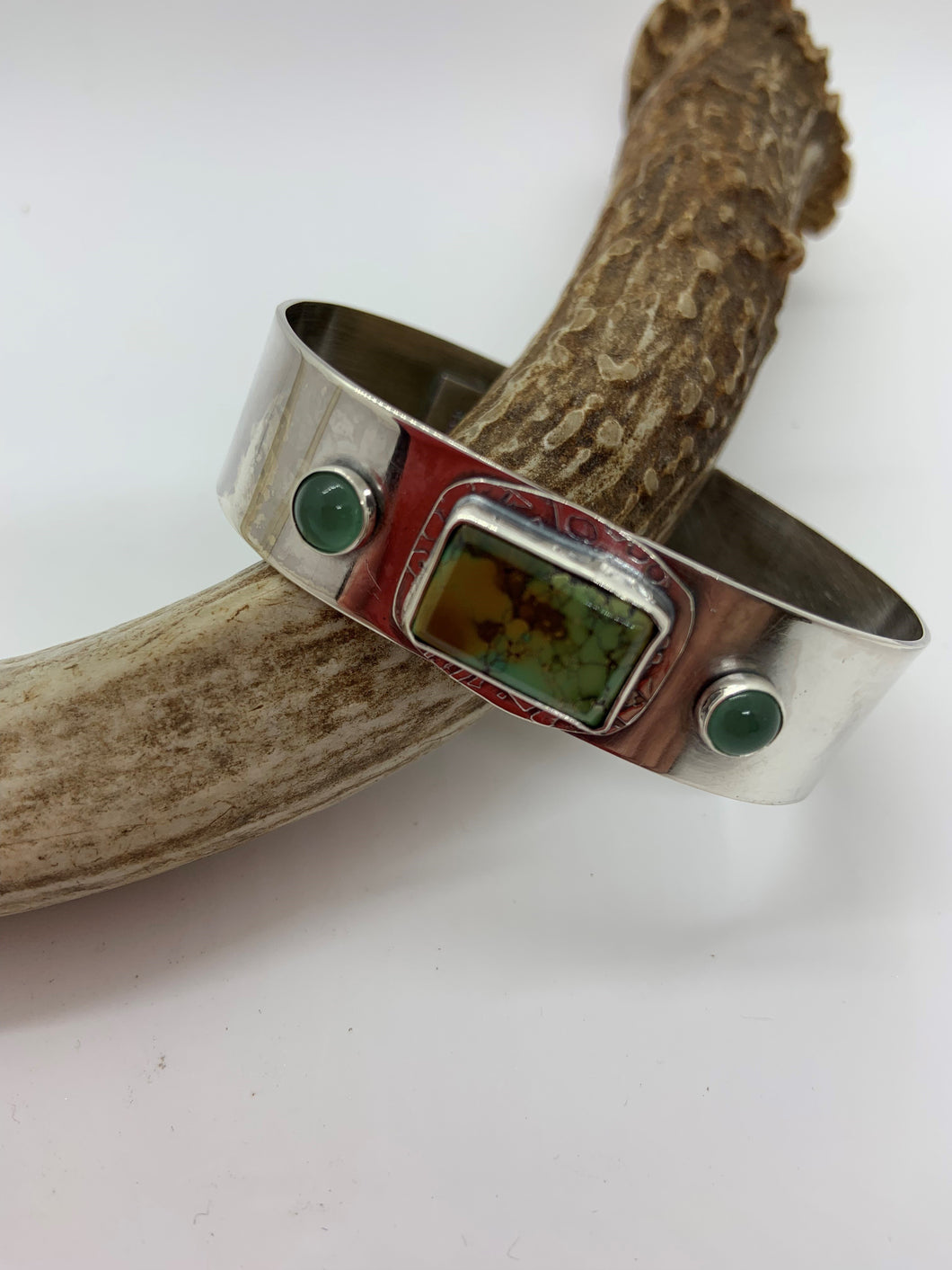 Sterling silver cuff bracelet with a square Bamboo Mountain turquoise stone and  2 Adventurine accent stones