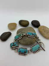 Load image into Gallery viewer, Sterling silver and Treasure Mountain turquoise bracelet.
